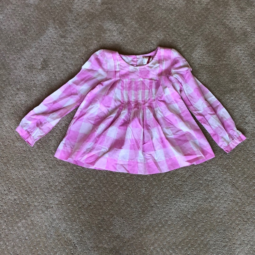 Pink plaid shirt.